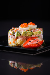 Round salad made of red fish potato and avocado