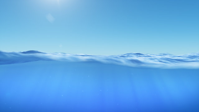 Ocean or sea in half water half sky. Rays of sunlight shining from above penetrate deep clear blue water. Realistic dark blue ocean surface. View - half of the sky, half water. 3D rendering