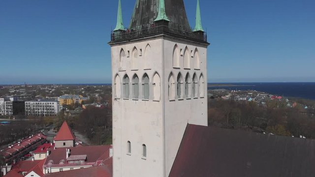 View top on historic centre of Tallinn in the Estonia. Red roofs of the old houses of the European city Tallinn. The ancient architecture. Roof with wings.
