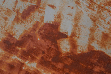 surface of rusty iron with remnants of old paint, orange texture, background