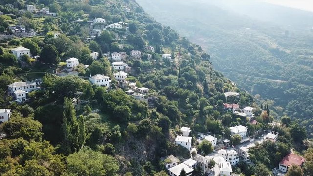 Greek houses on the hillside, aerial view