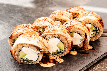 Philadelphia sushi with eel. Japanese, Pan-Asian cuisine, menu.