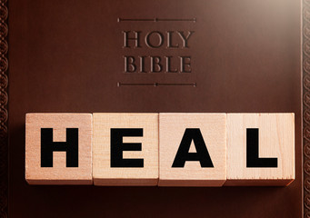 Heal Spelled in Blocks on a Leather Holy Bible