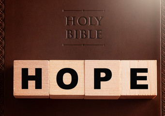 Hope Spelled in Blocks on a Brown Leather Holy Bible