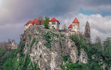 Fototapeta na wymiar Bled castle over Bled lake, historical sightseen on Slovenia