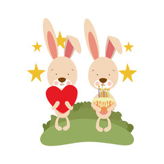 couple of bunnies with cake in hand