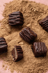 Homemade dark chocolate with walnut. Raw chocolate with nuts, kerob, stevia, acai, guarana. Selective focus, close up