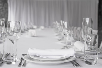 White banquet table setting. Serving for one person. Banquet table