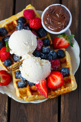 sweet belgian waffles with berries and ice cream