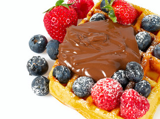 belgian waffles with berries and chocolate cream