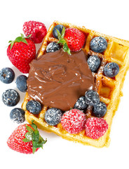belgian waffles with berries and chocolate cream