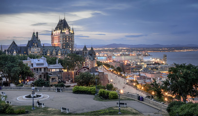 The Chateau Frontenac in Quebec city and Terrace Dufferin in sunset. 