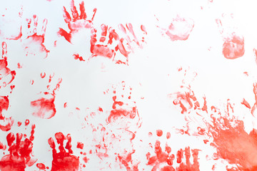 Hands of a little boy painting with watercolors on white paper sheet. Little boy with a brush and paints.  Back to school concept. Copyspace.