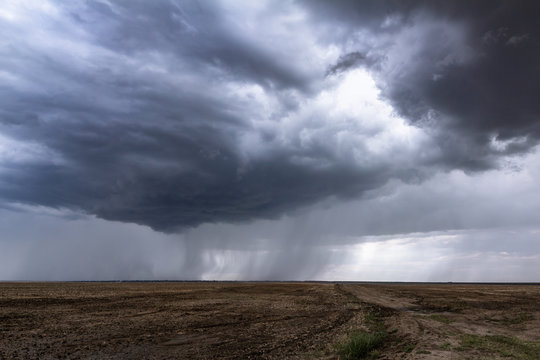 Landscape photo of the stormy rain with heavy dark clouds
