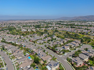 Aerial view suburban neighborhood with  big villas next to each other in Black Mountain, San Diego, California, USA. Aerial view of residential modern subdivision luxury house.