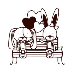 cute couple of dogs sitting on park chair