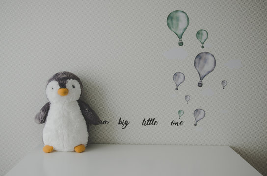 Baby Nursery With Penguin Toy