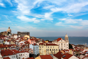 Fototapeta na wymiar View of São Vicente de Fora Church and all the typical Alfama neighborhood in Lisbon