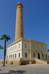 Fototapeta na wymiar Stone lighthouse in Chipiona in Andalusia in Spain in october.