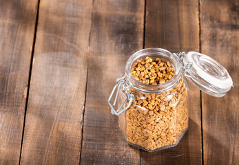 Trigonella foenum-graecum. Fenugreek seeds. Text space