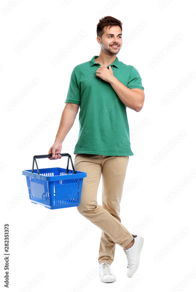 Canvas Prints Young man with empty shopping basket isolated on white