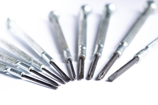 Mini screwdriver set closeup macro isolated on white background