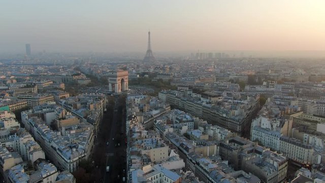Aerial: Paris City Towards Arc de Triomphe and Traffic Circle, France
