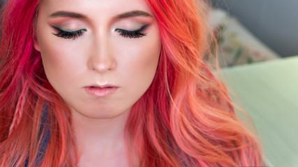 Fototapeta premium Beauty fashion model girl creative art makeup. Closed eyes. Holiday Make up. Trendy color modern stylish hairstyle. Ombre with pink hair. Beauty industry