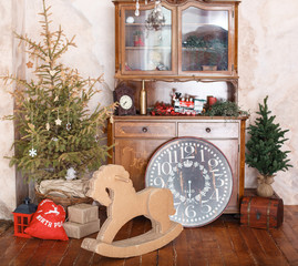 Fototapeta na wymiar Wooden toy horse, classic decorations. Vintage New Year decorations. Christmas mood in children room