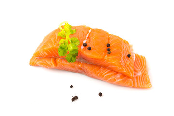 Raw salmon with coriander leaves and black pepper on the White Blackground