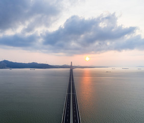 Fototapeta na wymiar aerial view of poyang lake second bridge in sunrise