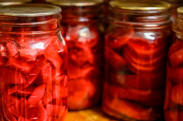 canned beats preserved in glass jars with metal lids