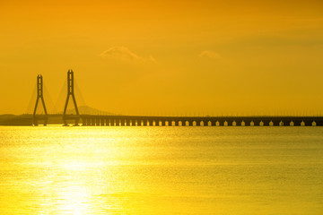 cable-stayed bridge closeup on lake