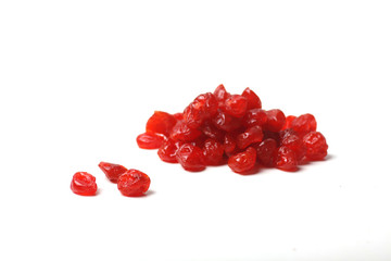 a pile of dried cherry on white background