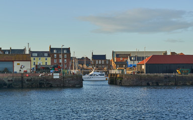 Looking through the open Lock Gates into Arbroath's inner harbour, where the new Marina now sits in the evening light.