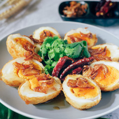 Fried boiled egg with tamarind sauce