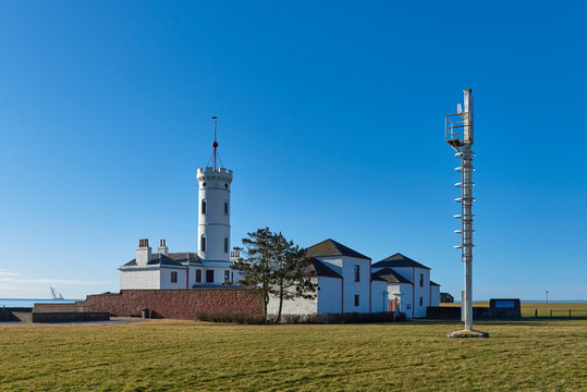 The Arbroath Signal Tower, which is now a museum,  stands on the Coastline just up from the Arbroath harbour, and in sight of the bell Rock Lighthouse.