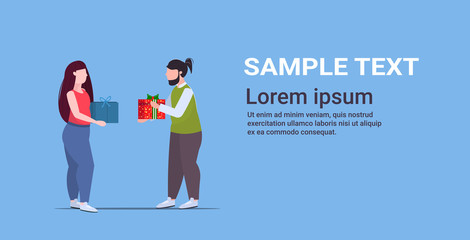 fat overweight couple giving surprise boxes presents to each other holiday celebration concept over size man woman in love horizontal copy space full length