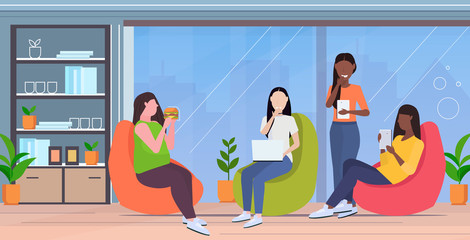 fat obese girl eating hamburger being bullied by mix race colleagues group obesity concept coworkers bullying sad overweight woman modern office interior flat horizontal full length