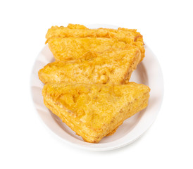 Indian Fried Snack Bread Pakora. It is also known as bread bhaji. A common street food, it is made from bread slices, gram flour, and spices among other ingredients