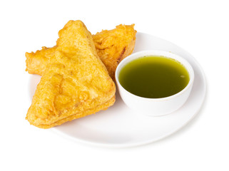 Indian Fried Snack Bread Pakora. It is also known as bread bhaji. A common street food, it is made from bread slices, gram flour, and spices among other ingredients