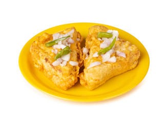 Indian Fried Snack Bread Pakora. It is also known as bread bhaji. A common street food, it is made from bread slices, gram flour, and spices among other ingredients
