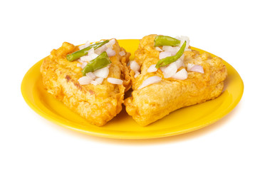 Indian Fried Snack Bread Pakora. It is also known as bread bhaji. A common street food, it is made from bread slices, gram flour, and spices among other ingredients