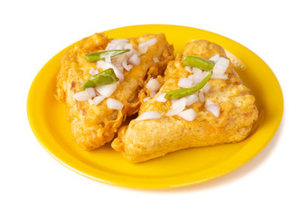 Indian Fried Snack Bread Pakora. It is also known as bread bhaji. A common street food, it is made from bread slices, gram flour, and spices among other ingredients