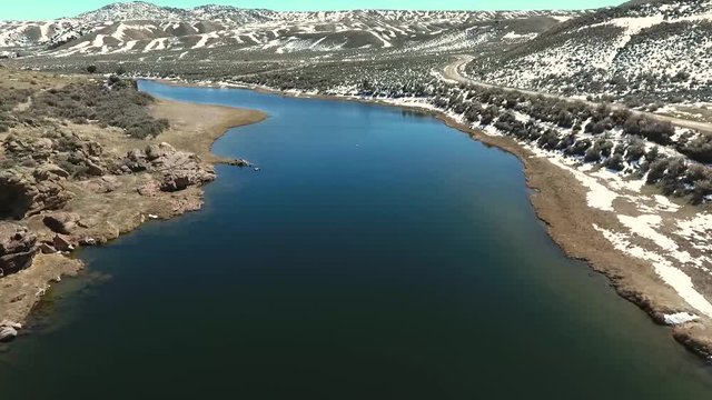Beautiful landscape over North Platte River on sunny winter day. Wyoming USA. Aerial traveling