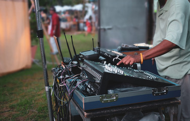 Dj playing music in live traditional festival