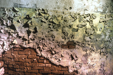 Old wall with cracked paint painting texture background