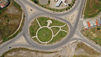 Aerial drone photo of modern motorway roundabouts of Ionia Odos near famous cable bridge of Rio - Antirio Harilaos Trikoupis, Antirio, Greece