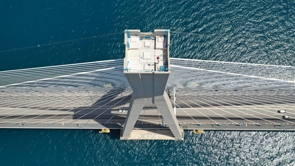 Aerial drone photo of modern cable anti seismic bridge crossing deep blue sea
