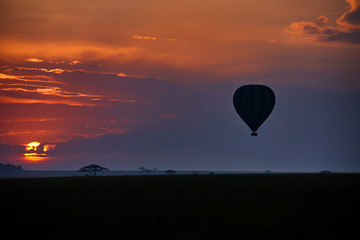 Hot air balloon against the setting sun